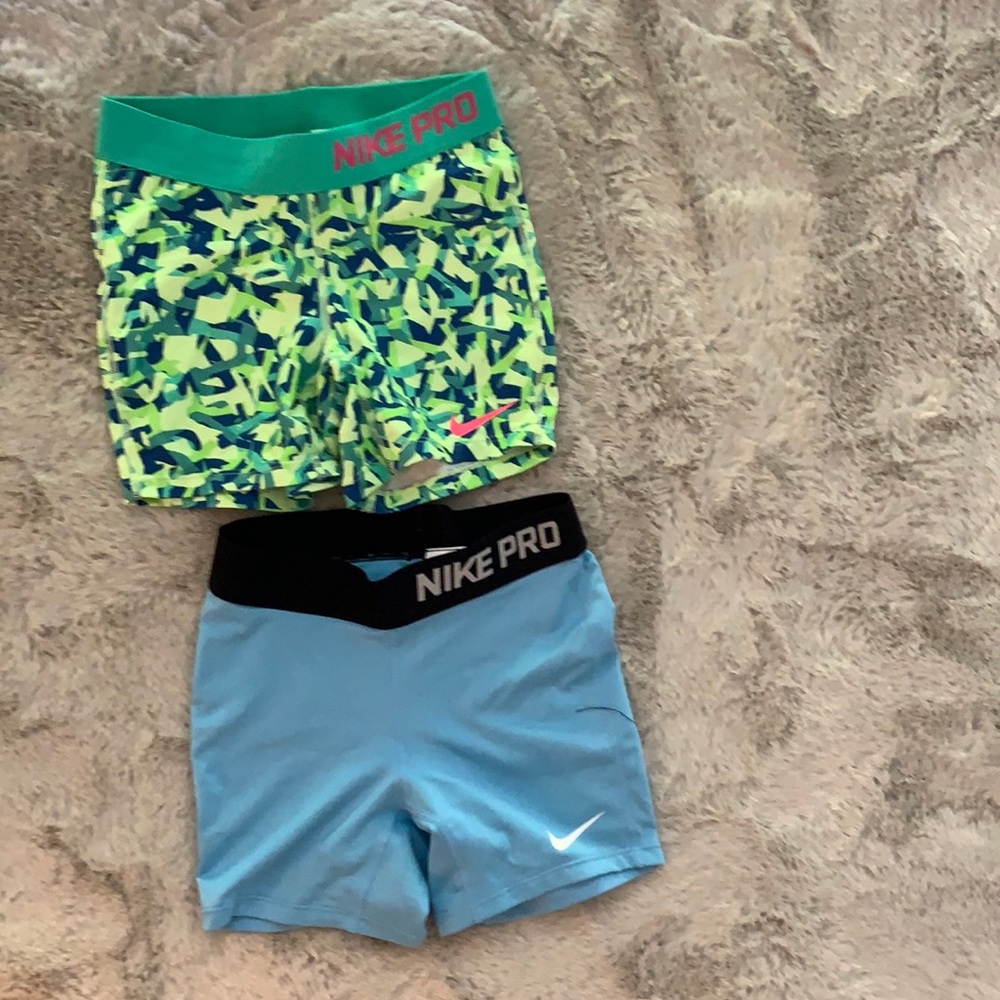 2 Paris of Nike pro shorts